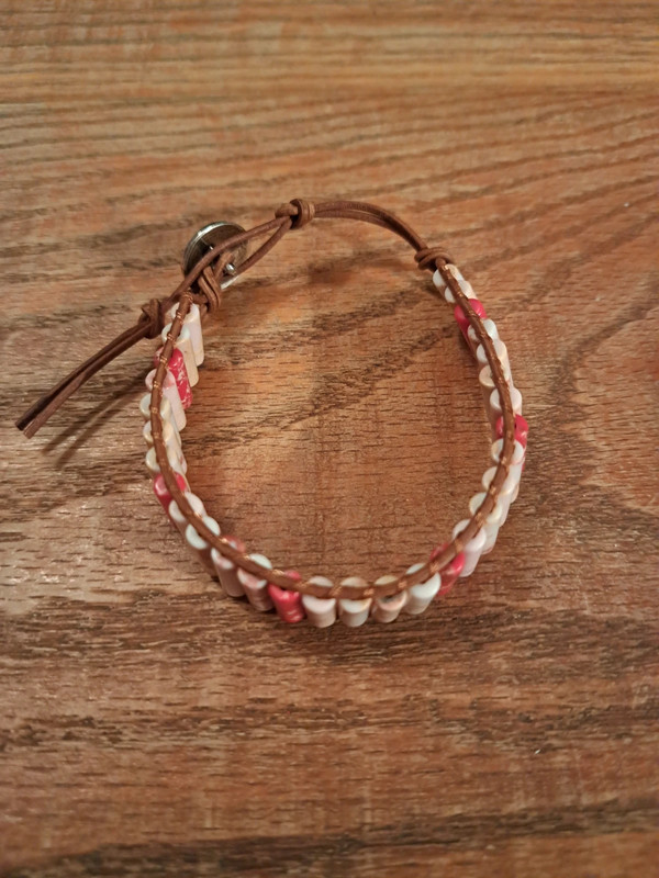 Pink stone bracelet with brown cord 3