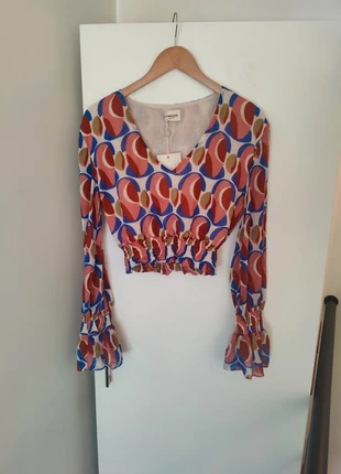 Haut coloré Symbiose Collection – Taille 38 – Neuf avec étiquette, merk: symbiose collection, staat: Nieuw met prijskaartje, maat: M / 38 / 10, € 24,00, € 25,90 inclusief Kopersbescherming