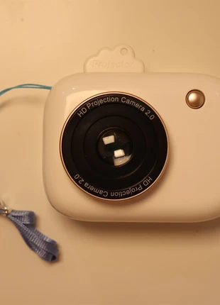 A mini projector, condition: New with tags, £5.00, £5.70 includes Buyer Protection