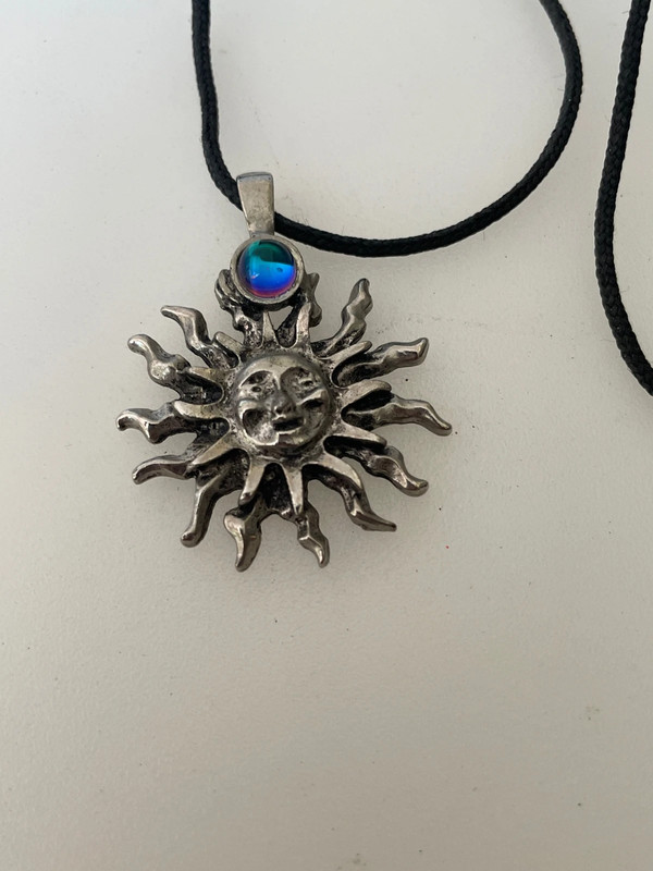 Mystical Sun Pendant With Iridescent Orb 1