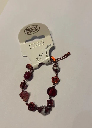 Rood armband, merk: MKM, staat: Heel goed, € 1,50, € 2,28 inclusief Kopersbescherming