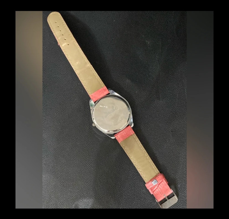 Sache watch with Rhinestones around face & Pink band-used 4