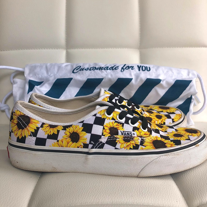 Vans checkered store with sunflowers