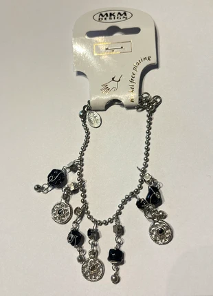 Zilver met zwart armband, merk: MKM, staat: Nieuw zonder prijskaartje, € 1,50, € 2,28 inclusief Kopersbescherming