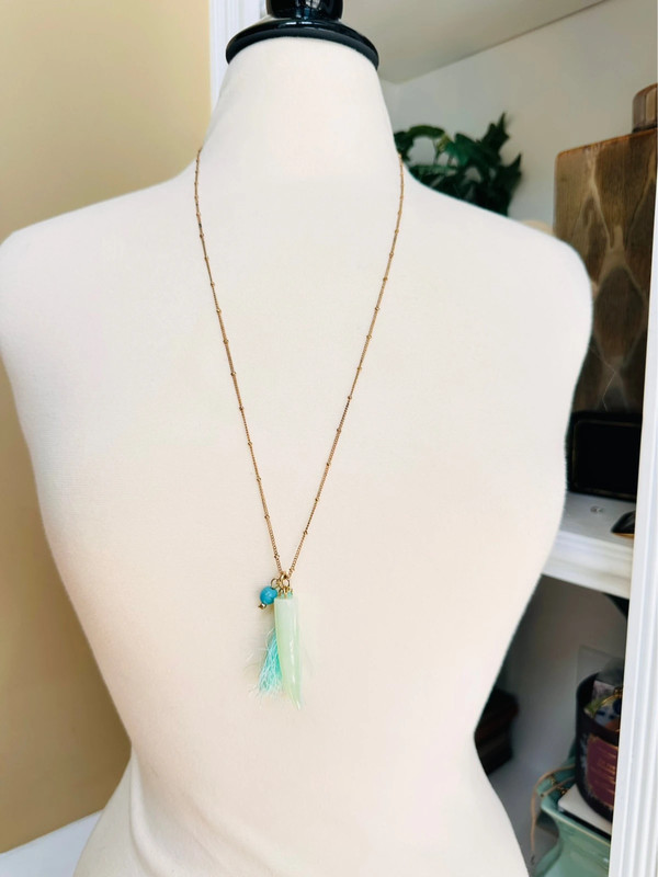 Gold necklace with turquoise horn 1