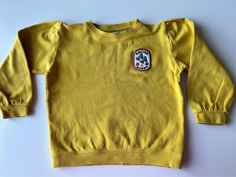 Sweat jaune bonton