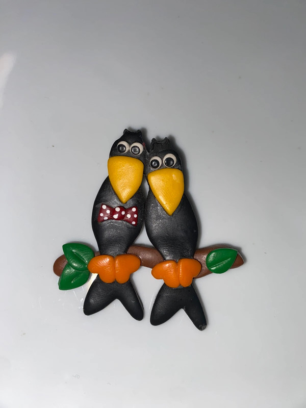 Vintage black plastic brooch double birds double toucans on perch black yellow orange 2