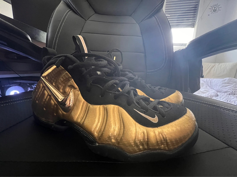 All black foams with gold nike sign sales