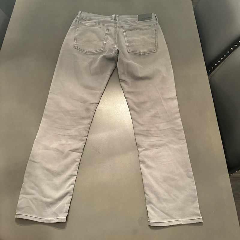 grey straight leg jeans. brand is depart west 4