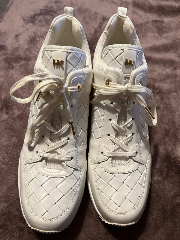 Georgie woven leather trainer sale michael kors