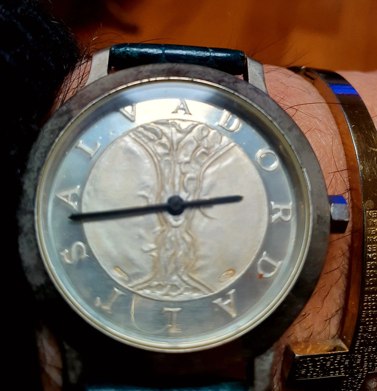 Orologio 2025 con moneta