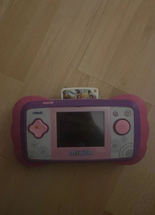 Console avc jeux, merk: MobiGo, staat: Heel goed, maat: 10 jaar / 140 cm, € 3,00, € 3,85 inclusief Kopersbescherming
