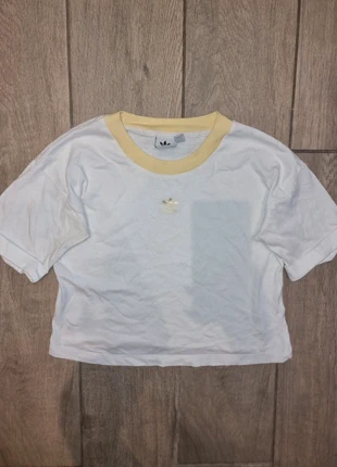 White Adidas t-shirt with soft buttermilk yellow logo + neckline, brand: adidas, condition: Very good, size: L / 12, £6.00, £7.00 includes Buyer Protection