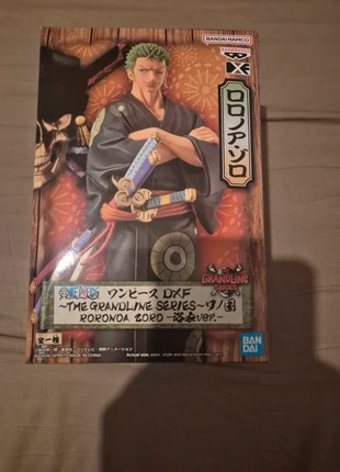 Figurine One Piece – Roronoa Zoro DXF Grandline Series Wanokuni (neuve, figurine sous blister), merk: Bandai, staat: Nieuw zonder prijskaartje, maat: Prematuur, tot 44 cm, € 25,00, € 26,95 inclusief Kopersbescherming