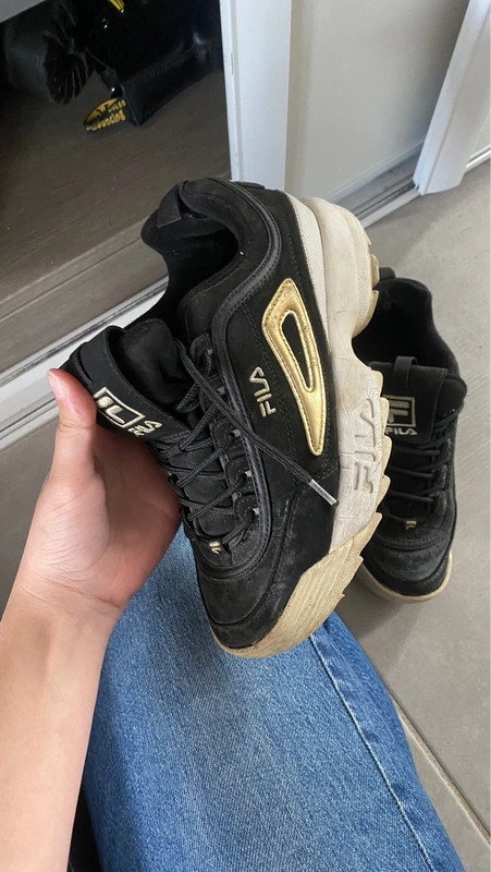 Fila noir top et dore