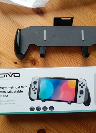 OIVO asymmetrical grip with adjustable stand, merk: oivo, staat: Heel goed, € 10,00, € 11,20 inclusief Kopersbescherming