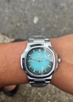 Montre Nautilus turquoise – Avec boîte, marke: Quartz, zustand: Neu, mit Etikett, größe: 39–42 mm, 13,00 €, 14,35 € inklusive Vinted-Käuferschutz
