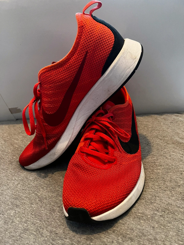 Nike red trainers deals