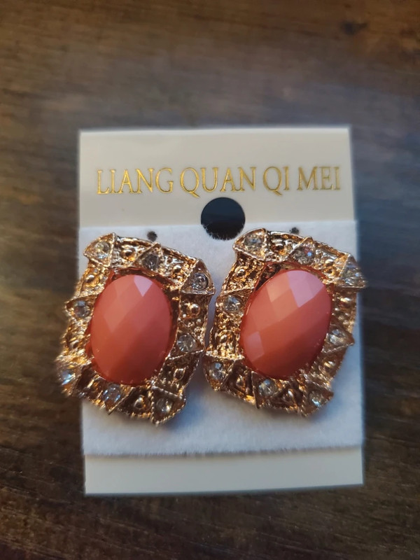 Pink orangish rhinestone stud earrings