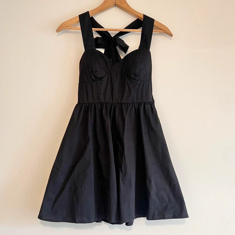 Black corset style mini dress with bow on back 2