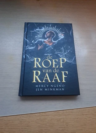 De Roep van de Raaf - Mercy Ngeno en Jen Minkman, staat: Nieuw zonder prijskaartje, € 9,00, € 10,15 inclusief Kopersbescherming