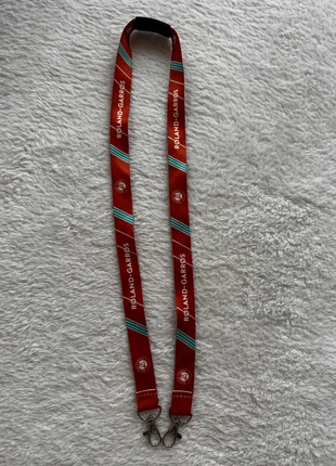 Roland Garros Lanyard, merk: Roland Garros, staat: Heel goed, € 16,00, € 17,50 inclusief Kopersbescherming