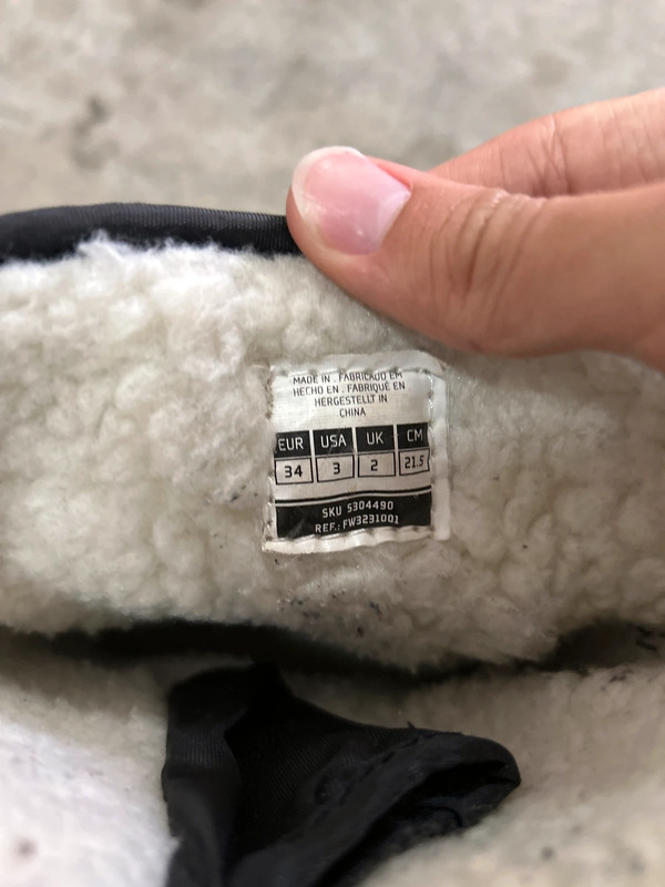 Bota de top neve usada