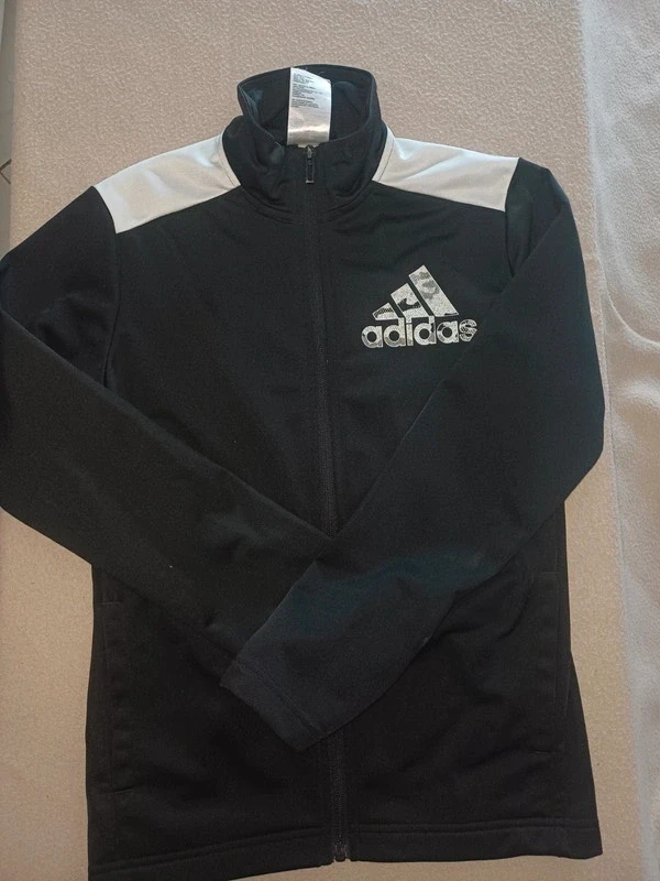 Superbe veste de Survêtement 12 ans garçon