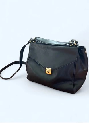 Vintage Black faux leather shoulder bag with gold hardware, featuring a buckle closure, brand: NO LABEL, condition: Good, £8.00, £9.10 includes Buyer Protection