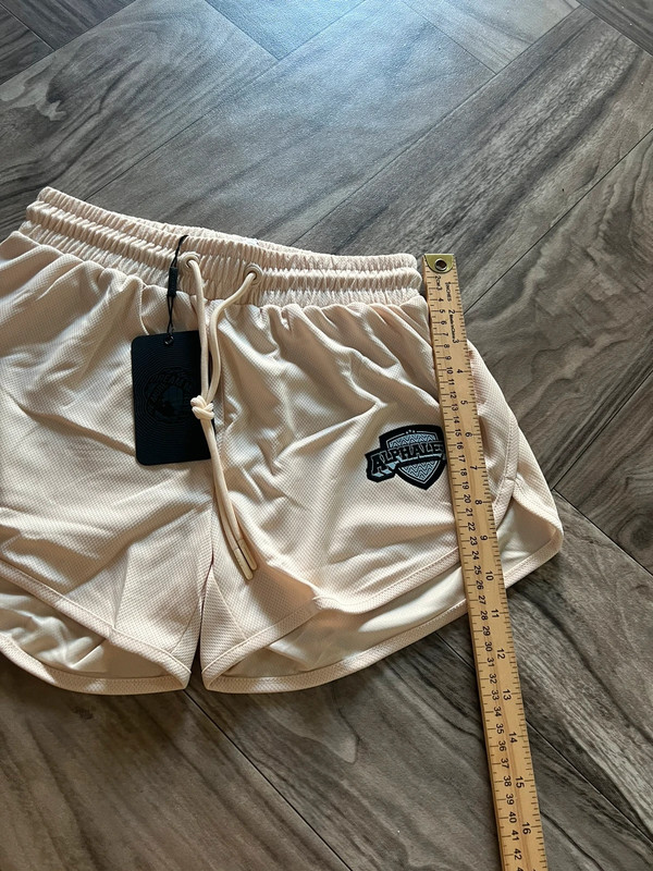 NEW Alphalete Woman’s Varsity Short - Tan ,size XS 5