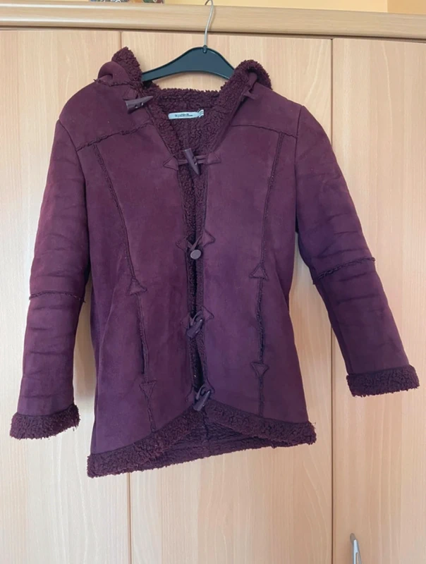 Manteau violet tape à l’œil