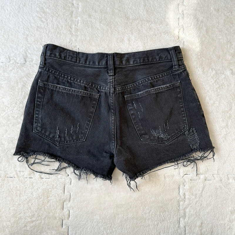 Free People We The Free black distressed denim shorts, size 27 5