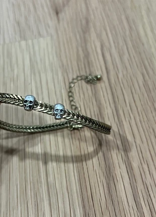 Men’s gold bracelet with 2 silver skulls, marca: Vintage Dressing, estado: Novo sem etiquetas, €10.00, €11.20 inclui Proteção do Comprador