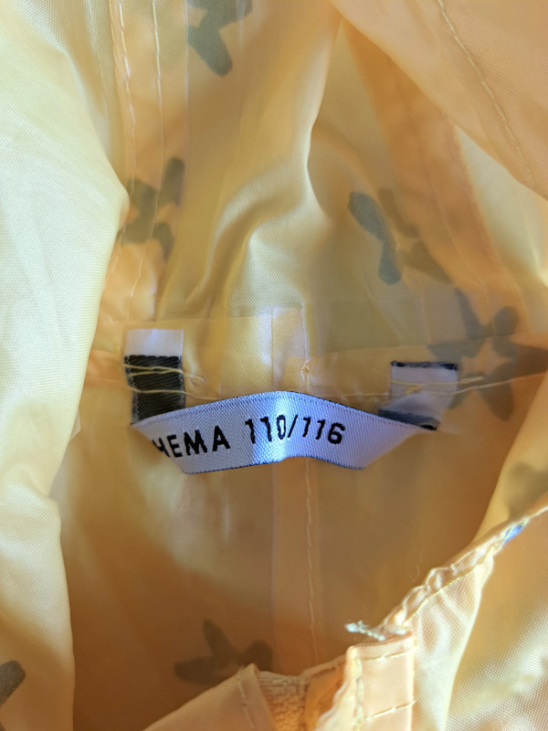 Gele regenjas ster Hema Vinted