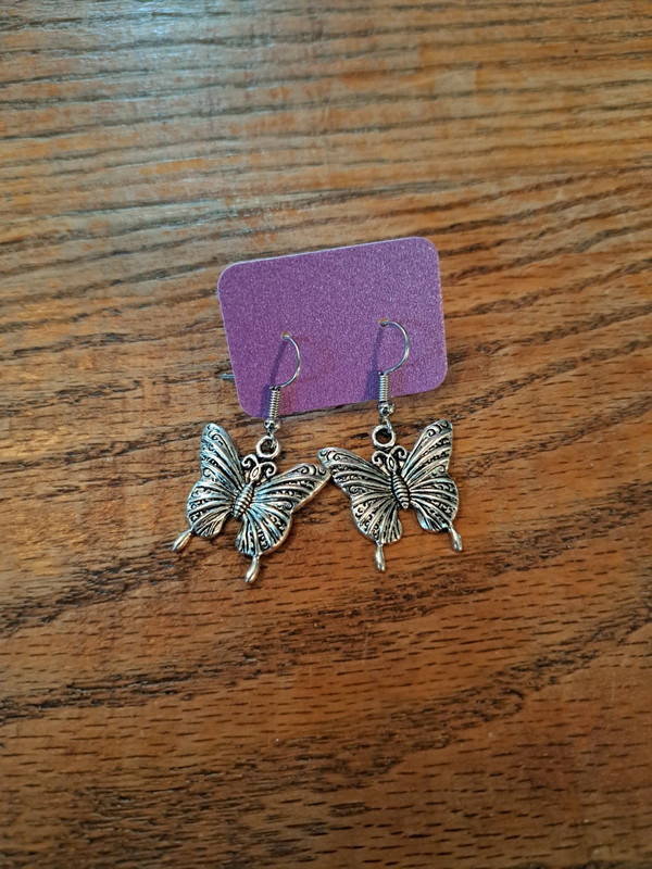 Butterfly charm earrings in silver 2