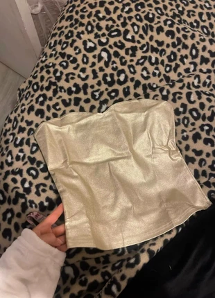 Haut bustier doré brillant parfait pour une soirée ou une tenue élégante, staat: Nieuw zonder prijskaartje, maat: S / 36 / 8, € 30,00, € 32,20 inclusief Kopersbescherming