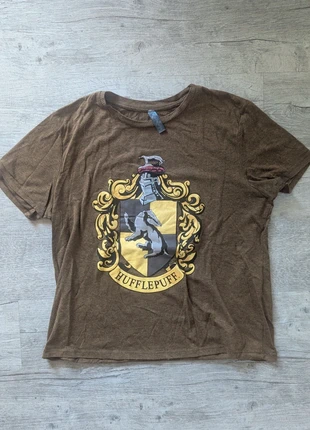 T-shirt Pouffsouffle, marque: Harry Potter, état: Très bon état, taille: L / 40 / 12, 4,00 €, 4,90 € Protection acheteurs incluse