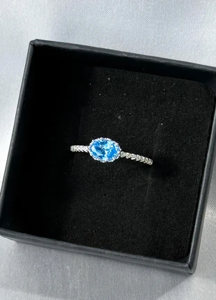 Bague en argent poinçonnée + cristal bleu et zirconiums - T56, merk: Marc orian, staat: Nieuw zonder prijskaartje, maat: 56.9 mm / 18.1 mm Ø, € 28,00, € 30,10 inclusief Kopersbescherming
