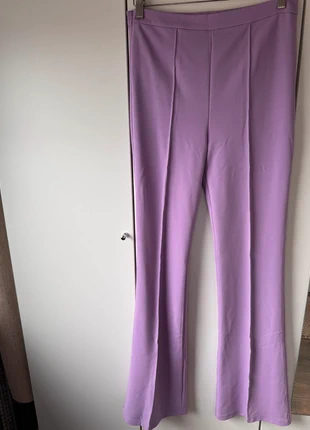 Flare broek curve Lila paars, merk: IVIVI, staat: Goed, maat: L / 40 / 12, € 7,50, € 8,58 inclusief Kopersbescherming