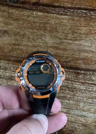 Montre calypso orange et noir, brand: Calypso, condition: Very good, size: 39–42 mm, €4.00, €4.90 includes Buyer Protection