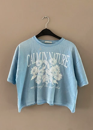 Lichtblauw shirtje van Pull&Bear, marca: Pacific Republic, estado: Bom, tamanho: M / 38 / 10, €2.00, €2.80 inclui Proteção do Comprador