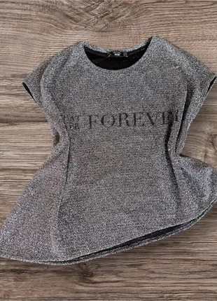 Magnifique tee shirt brillant noir et argenté, marca: Bershka, estado: Muy bueno, tamaño: XS / 34 / 6, 4,00 €, 4,90 € Protección al comprador incluida