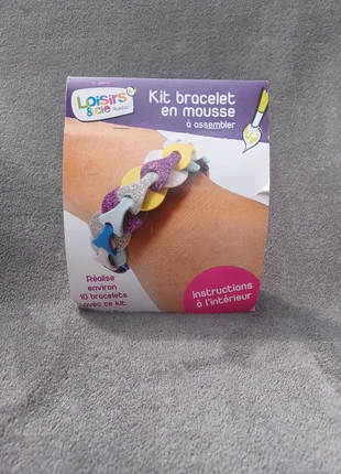 Kit bracelet en mousse, staat: Nieuw met prijskaartje, maat: Universeel, € 1,00, € 1,75 inclusief Kopersbescherming