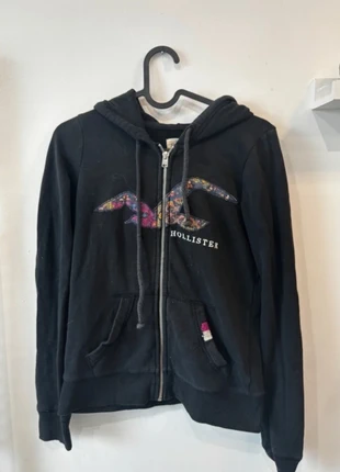 Gilet Hollister noir – Taille XS – Logo oiseau coloré, merk: Hollister, staat: Heel goed, maat: XS / 34 / 6, € 8,00, € 9,10 inclusief Kopersbescherming