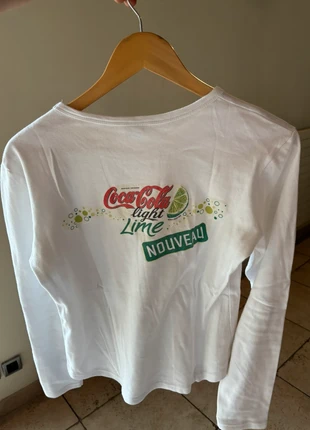 t shirt manches longues coca cola, marke: Vintage Love, zustand: Sehr gut, größe: M / 38 / 10, 13,00 €, 14,35 € inklusive Vinted-Käuferschutz