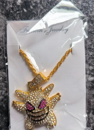 Pendentif / collier ectoplasma pokémon or, marke: Pokémon, zustand: Neu, mit Etikett, 6,00 €, 7,00 € inklusive Vinted-Käuferschutz