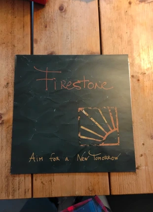 Firestone - Aim For A New Tomorrow Vinyl LP, staat: Goed, € 9,50, € 10,68 inclusief Kopersbescherming