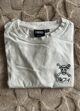 T-shirt blanc One Piece, marke: Courir, zustand: Sehr gut, größe: XS, 3,00 €, 3,85 € inklusive Vinted-Käuferschutz