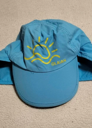 Gorra azul con protección para el cuello, marca: Olaian, estado: Muy bueno, tamaño: 6-12 meses, 47 cm, 2,00 €, 2,80 € Protección al comprador incluida
