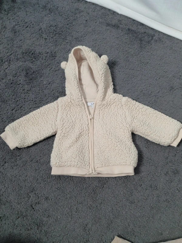 Manteau moumoute taille 9 mois